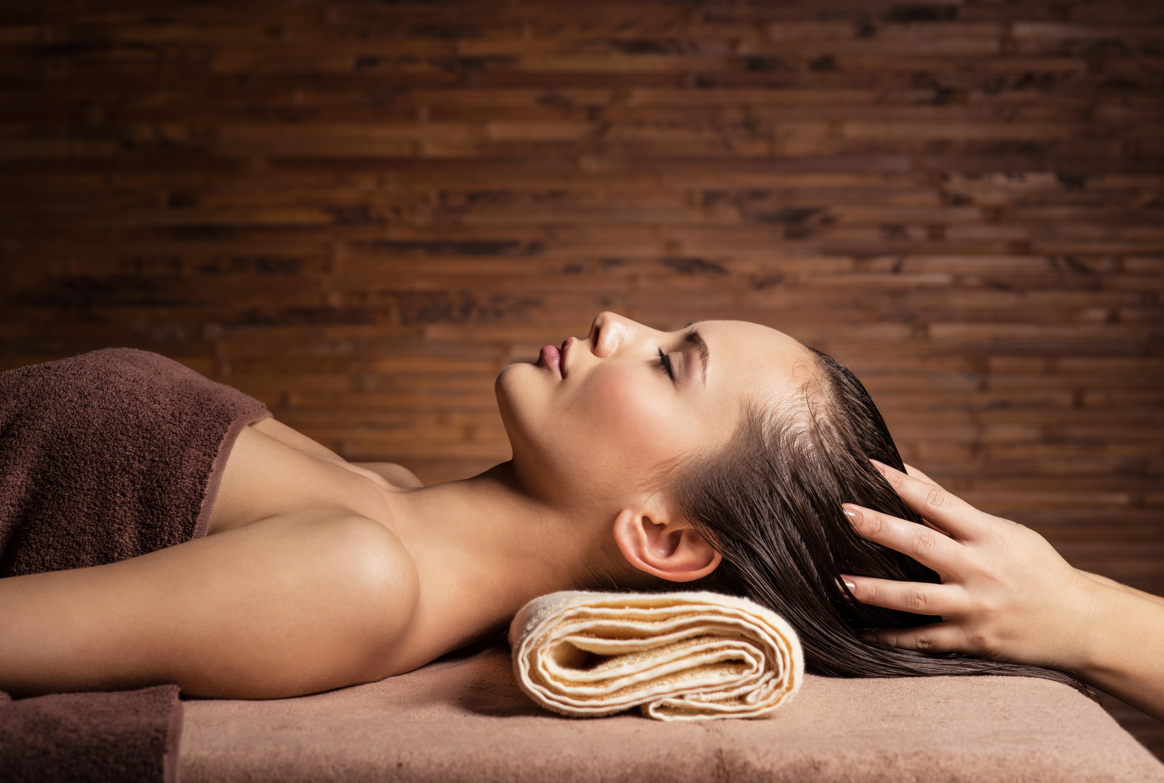 Woman Receiving Scalp Massage at Spa